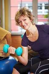 middle-aged-woman-lifting-a-dumbbell